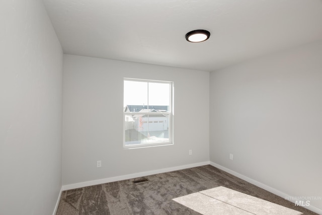 19361 James Ave, Caldwell, ID 83605 - unfurnished room with baseboards, visible vents, and carpet floors