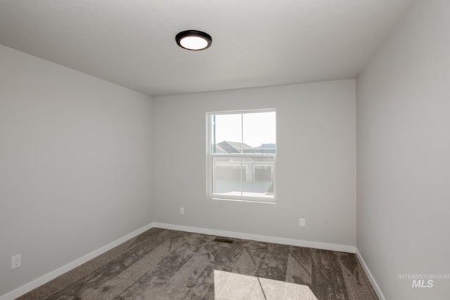 19361 James Ave, Caldwell, ID 83605 - carpeted spare room featuring visible vents and baseboards
