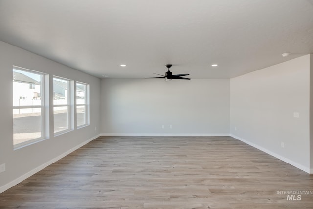 19361 James Ave, Caldwell, ID 83605 - spare room featuring recessed lighting, baseboards, wood finished floors, and a ceiling fan