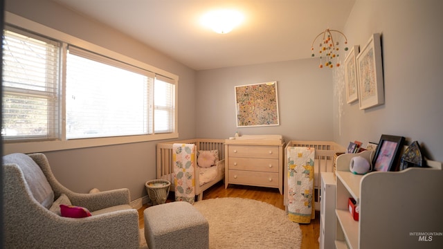 bedroom featuring wood finished floors