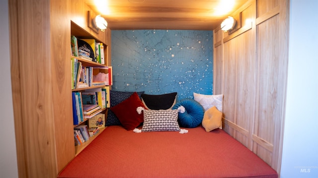 sitting room featuring carpet floors