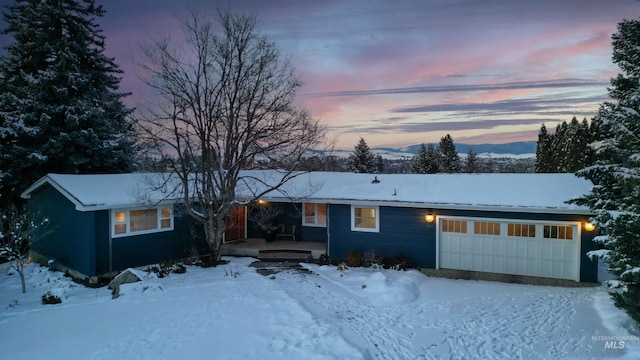 single story home with an attached garage