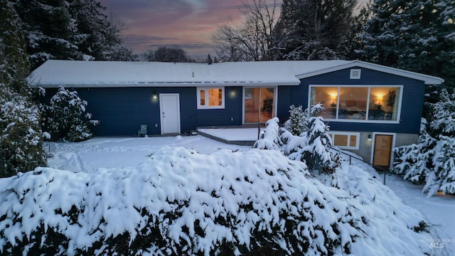 view of front of property with a garage