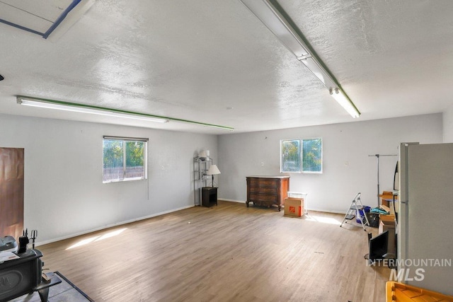 712 Yakima Ave, Filer, ID 83328 - miscellaneous room with plenty of natural light, wood finished floors, a textured ceiling, and baseboards