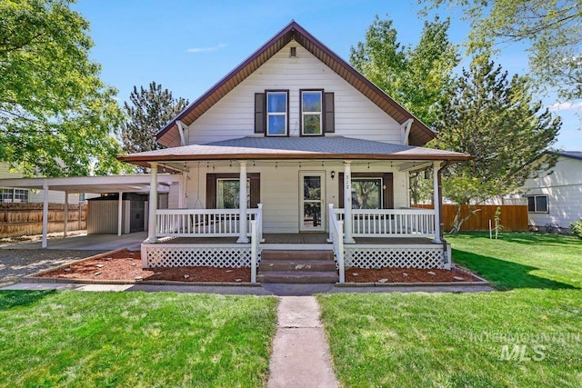 712 Yakima Ave, Filer, ID 83328 - view of front of home featuring a porch and an attached carport