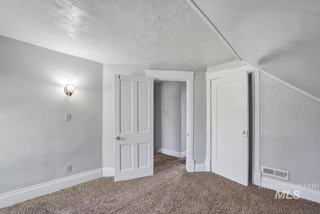 712 Yakima Ave, Filer, ID 83328 - additional living space with carpet, baseboards, and a textured ceiling