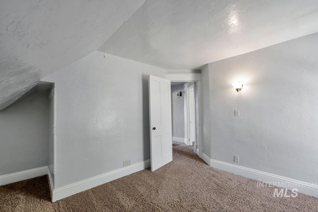 712 Yakima Ave, Filer, ID 83328 - bonus room featuring carpet flooring, lofted ceiling, and baseboards