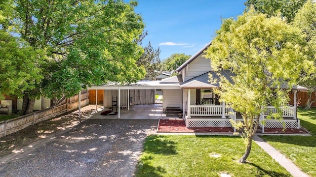712 Yakima Ave, Filer, ID 83328 - view of front of property featuring driveway and covered porch