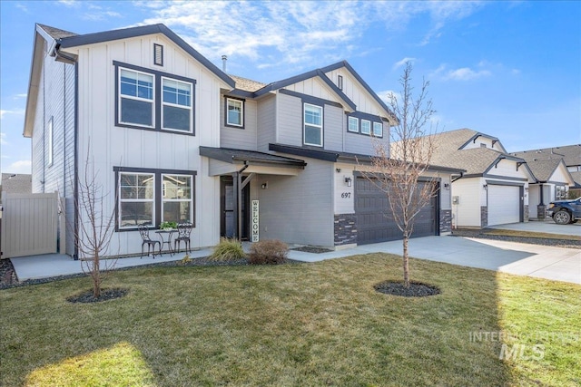 view of front of house with board and batten siding, stone siding, driveway, and a front lawn