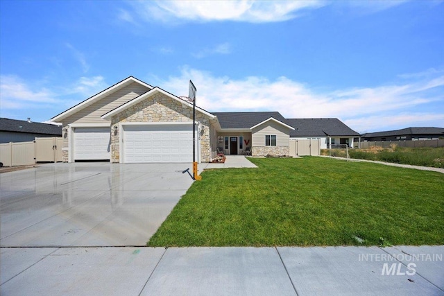 ranch-style home featuring concrete driveway, stone siding, an attached garage, fence, and a front lawn