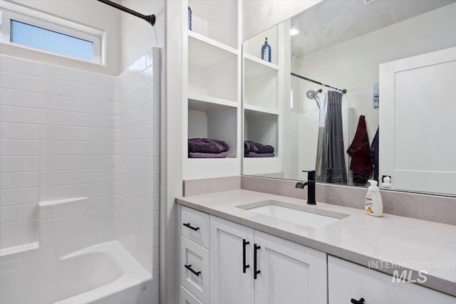 full bath with shower / tub combo and vanity