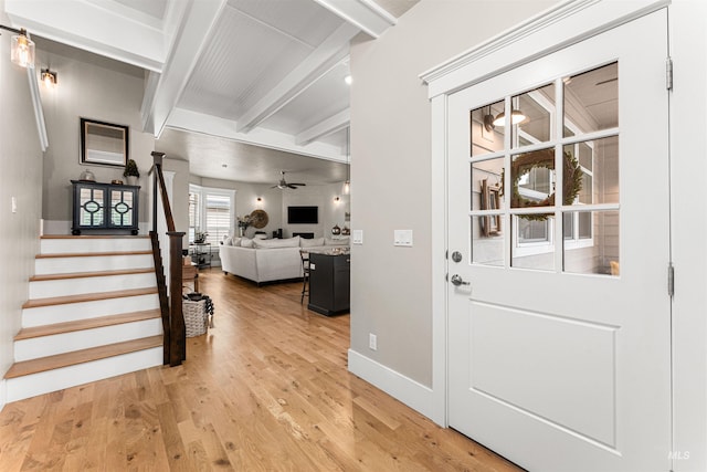733 W Cowman St, Eagle, ID 83616 - entryway featuring beamed ceiling, light wood finished floors, stairs, and a ceiling fan