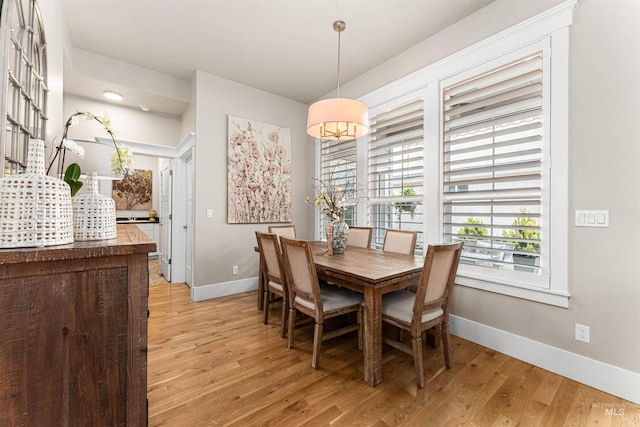 733 W Cowman St, Eagle, ID 83616 - dining space featuring baseboards and light wood-style flooring