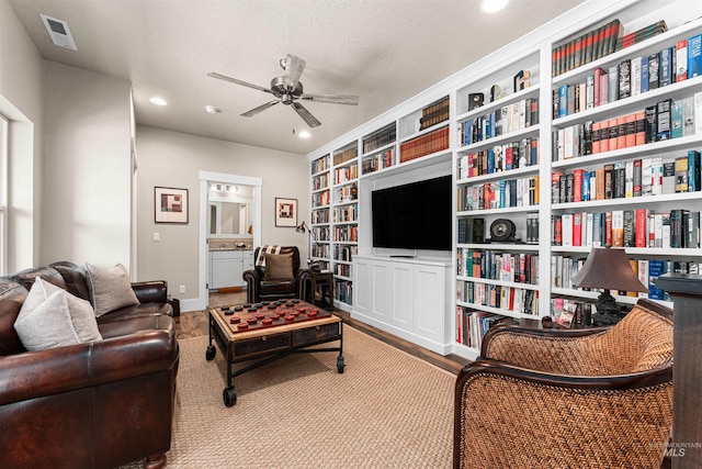 733 W Cowman St, Eagle, ID 83616 - living area featuring a ceiling fan, built in features, and recessed lighting