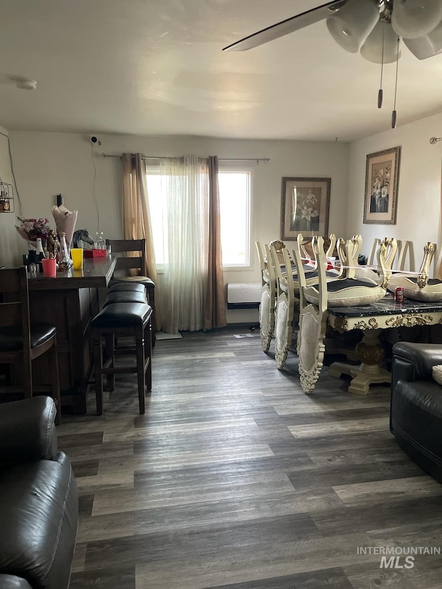 bedroom with ceiling fan and wood finished floors