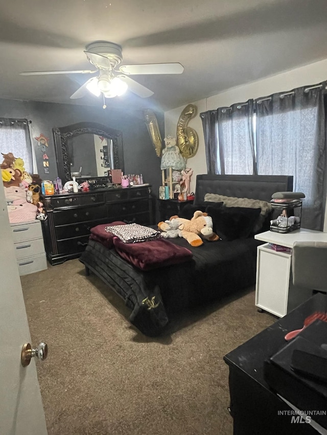 carpeted bedroom featuring a ceiling fan