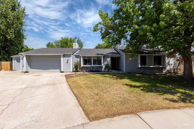 10276 W Summerwind Dr, Boise, ID 83704 - single story home featuring concrete driveway, a garage, a front yard, and a chimney