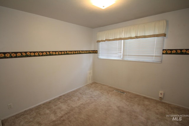 7644 W Cambridge Dr, Boise, ID 83704 - unfurnished room with carpet flooring