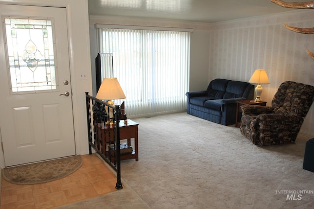 7644 W Cambridge Dr, Boise, ID 83704 - living room featuring wallpapered walls and crown molding