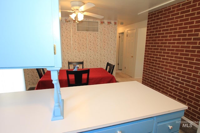 7644 W Cambridge Dr, Boise, ID 83704 - dining area featuring ceiling fan and wallpapered walls