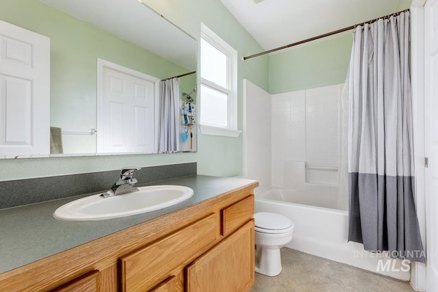 full bathroom featuring toilet, shower / bathtub combination with curtain, and vanity