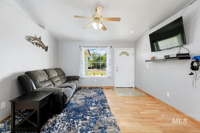 living room with recessed lighting, baseboards, a ceiling fan, and wood finished floors