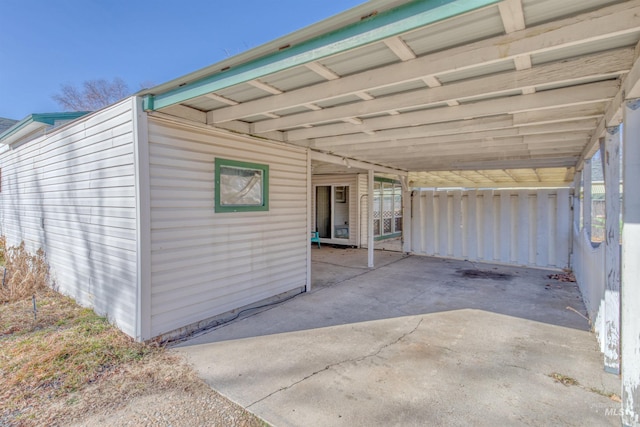 exterior space with a carport