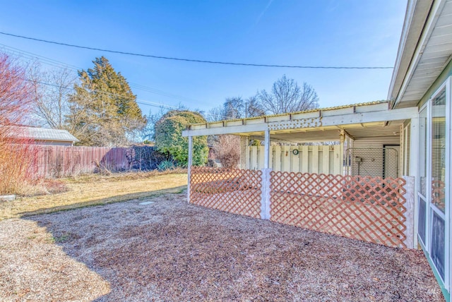 view of yard with fence