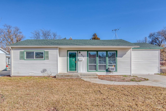 view of front of house with a front lawn and cooling unit