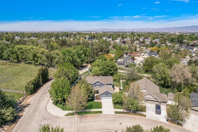 aerial perspective of suburban area with a mountainous background