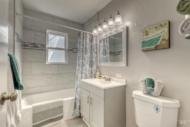full bathroom featuring toilet, shower / bath combo, and vanity