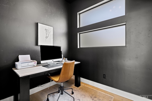 office space featuring light hardwood / wood-style floors