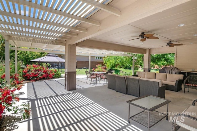 view of patio with an outdoor hangout area, ceiling fan, outdoor dining area, and a pergola