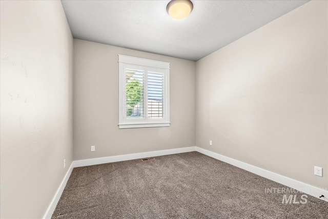 495 W Tall Prairie Dr, Meridian, ID 83642 - empty room featuring carpet floors and baseboards