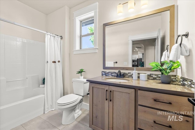 495 W Tall Prairie Dr, Meridian, ID 83642 - bathroom featuring toilet, vanity, tile patterned flooring, shower / tub combo with curtain, and tasteful backsplash