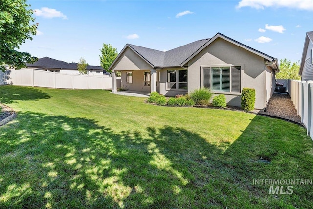 495 W Tall Prairie Dr, Meridian, ID 83642 - back of property featuring a patio and stucco siding