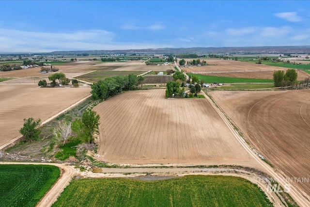 birds eye view of property featuring a rural view