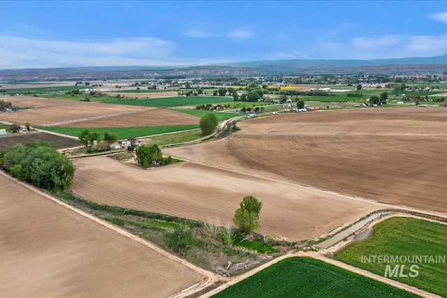 bird's eye view with a mountain view and a rural view