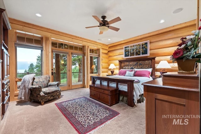 1533 Pine Lakes Ranch Dr, Cascade, ID 83611 - bedroom with light colored carpet, access to outside, rustic walls, recessed lighting, and a ceiling fan