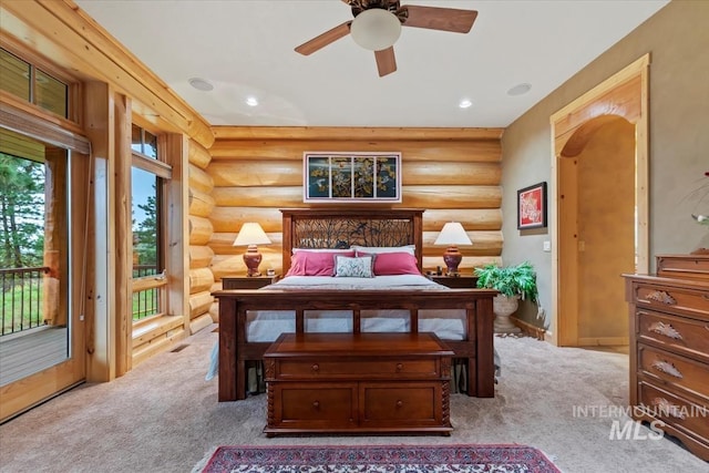 1533 Pine Lakes Ranch Dr, Cascade, ID 83611 - carpeted bedroom featuring rustic walls, access to exterior, and recessed lighting