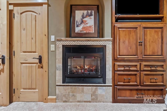 1533 Pine Lakes Ranch Dr, Cascade, ID 83611 - detailed view of a tiled fireplace