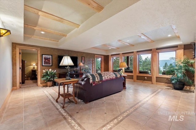 1533 Pine Lakes Ranch Dr, Cascade, ID 83611 - living room featuring a raised ceiling and light tile patterned floors