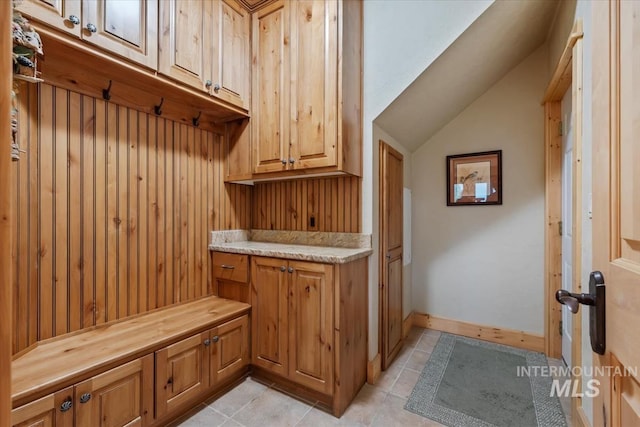 1533 Pine Lakes Ranch Dr, Cascade, ID 83611 - laundry area with light tile patterned floors