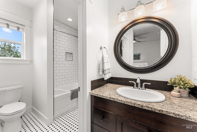 1912 N Bottle Creek Pl, Eagle, ID 83616 - full bathroom with toilet, ceiling fan, vanity, baseboards, and tile patterned flooring