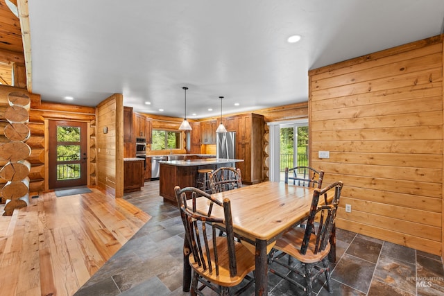 881 Sheila, Mccall, ID 83638 - dining space with recessed lighting and rustic walls