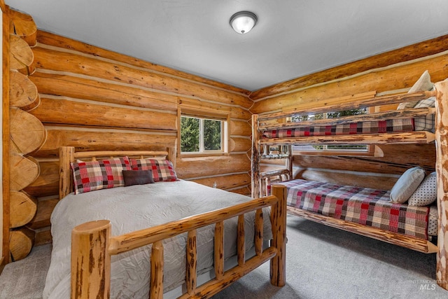 881 Sheila, Mccall, ID 83638 - carpeted bedroom with rustic walls