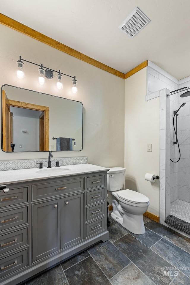 881 Sheila, Mccall, ID 83638 - bathroom featuring vanity, a tile shower, and stone tile flooring