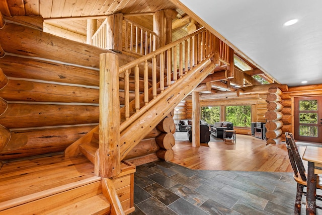 881 Sheila, Mccall, ID 83638 - staircase with rustic walls and recessed lighting