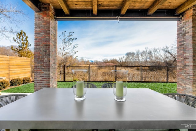 view of patio / terrace with outdoor dining area and a fenced backyard