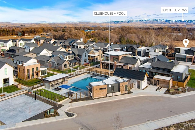 bird's eye view featuring a mountain view and a residential view